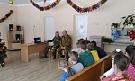 Ветераны-пограничники Лунинца поздравили воспитанников социально-педагогического центра с новогодними праздниками